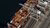 Container ship in terminal under cranes